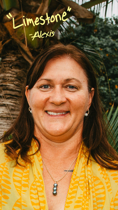 Woman with a yellow top and necklace, surrounded by greenery with 'Limestone' and 'Alexis' text.