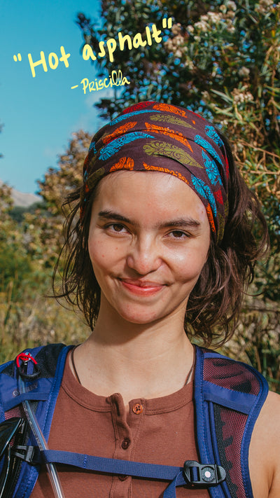 Person with a colorful headband and backpack in a natural setting with text 'Hot asphalt' and 'Pacifica'.