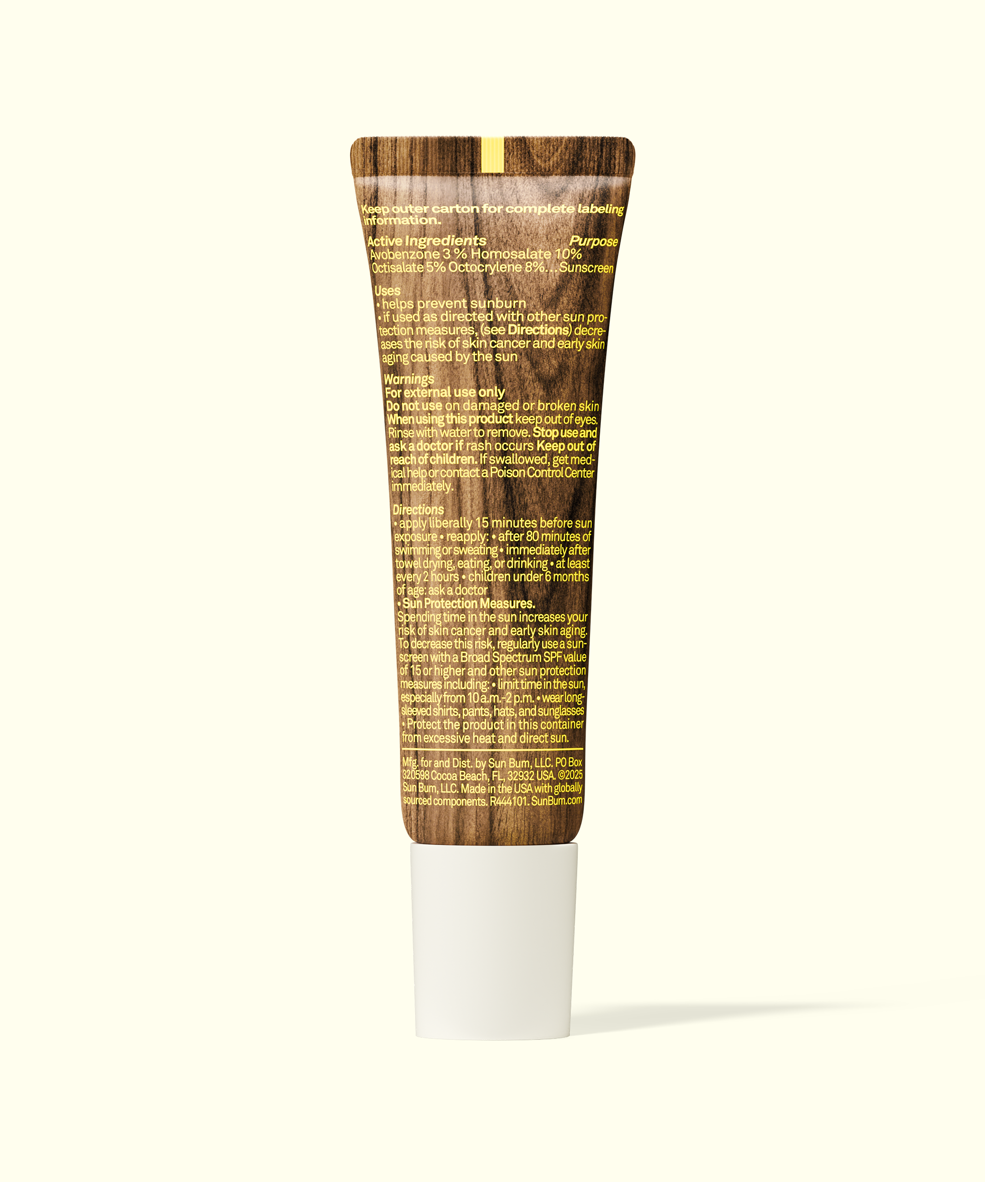 Tube of skincare product with wooden-textured label on a white background